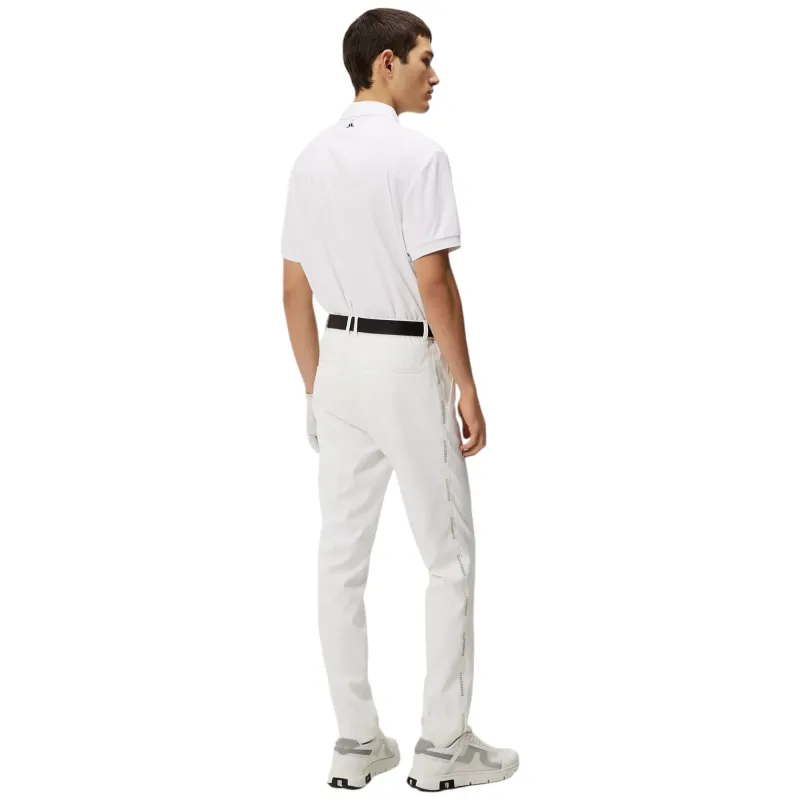 Lindeberge - Polo Tour Tech Blanc Logo Manche Reg Fit - Golf Plus Lindeberge - Polo Tour Tech Blanc Logo Manche Reg Fit - Golf Plus